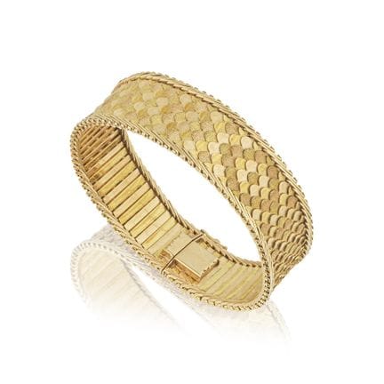 PULSERA DE ORO
Con eslabones bicolores con textura