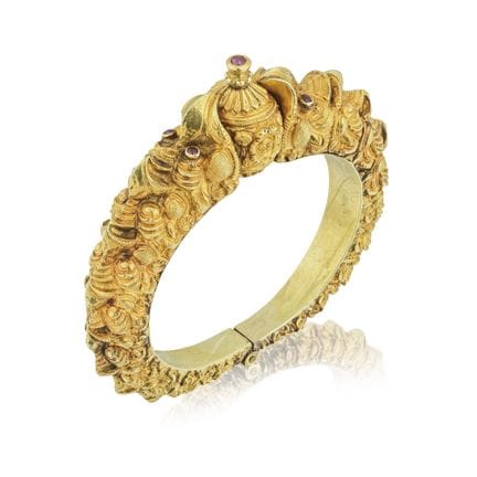 PULSERA DE ARO CON CABEZA DE MAKARA DE ORO Y RUBÍE