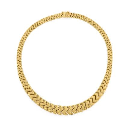 COLLAR DE ORO
Formado por eslabones entrelazados e