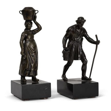 Due figure in bronzo raffiguranti un mietitore e u