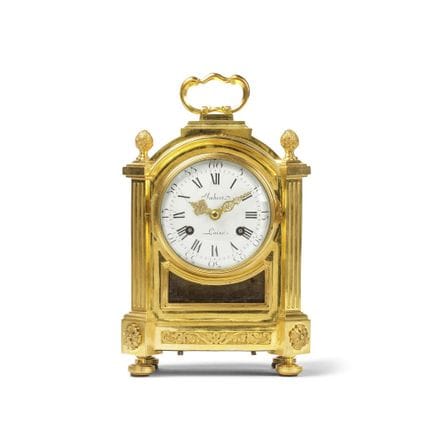 Orologio da camino in bronzo dorato, fine del XVII