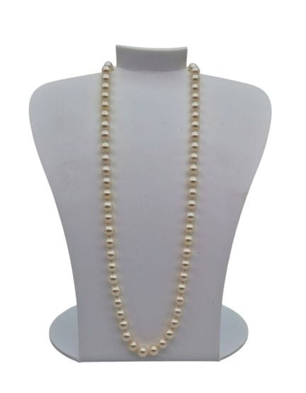 Cultured pearl choker necklace with a gold clasp. 