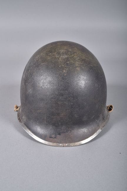 US—M1 helmet. Green-painted steel shell, rim reinf