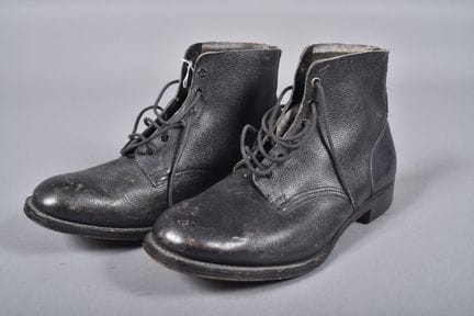 GB—Pair of black grained leather boots with smooth