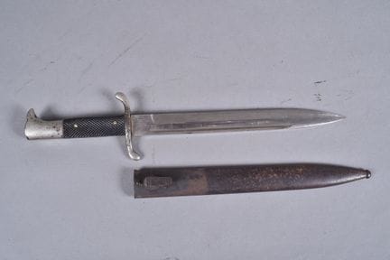 Exit bayonet knife. Nickel-plated metal eagle-head