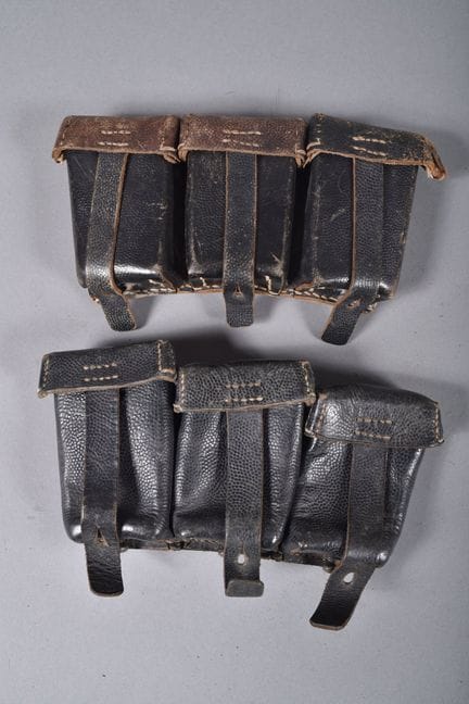 All—Two M-1933 cartridge belts made of black grain