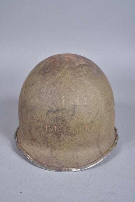 US—M1 helmet. Olive-green painted steel shell with
