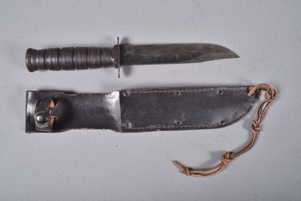 US—Camillus dagger. Leather handle. Bronze-finishe