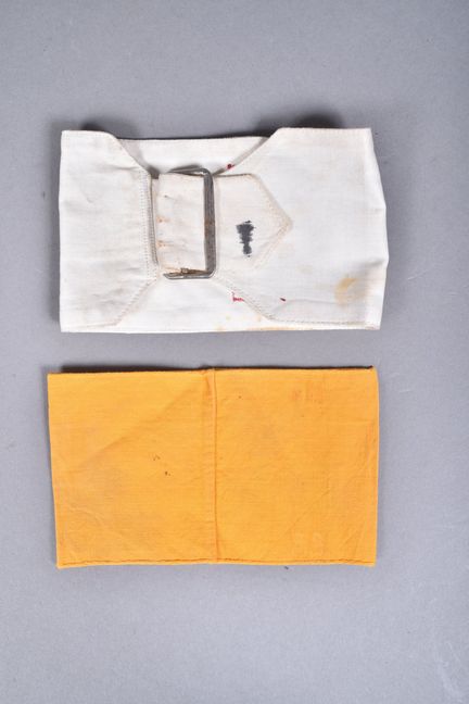 All. Set of 2 armbands, one with the red cross and