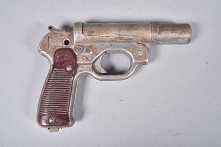 All—LP 42 model metal flare gun, with reddish-brow