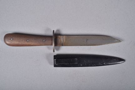 Puma combat dagger. Handle with riveted wooden sca