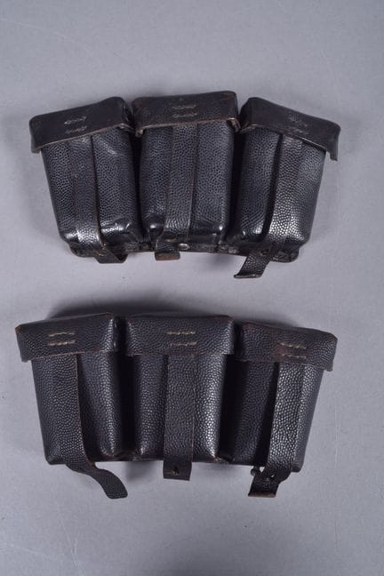 Two 1911 cartridge belts in black leather and rect