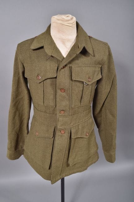 GB—Australian khaki-colored four-pocket jacket. In