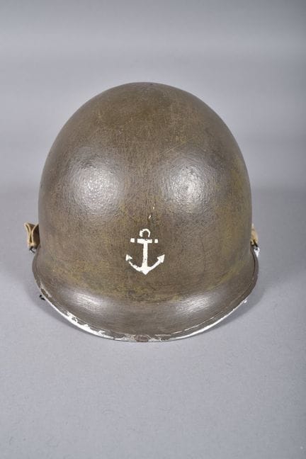 Fr - American M1 helmet. Khaki steel shell with a 