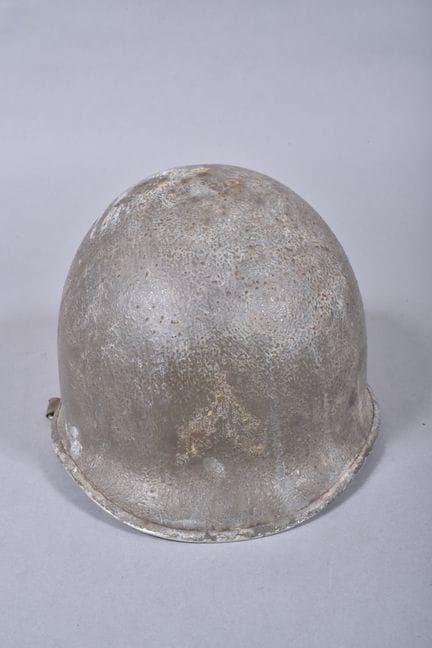 US- M1 helmet shell in olive green painted steel. 