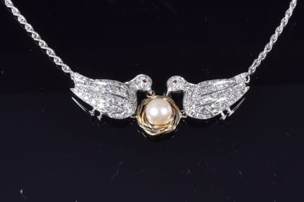 Collier en or gris (750 millièmes) et platine (850