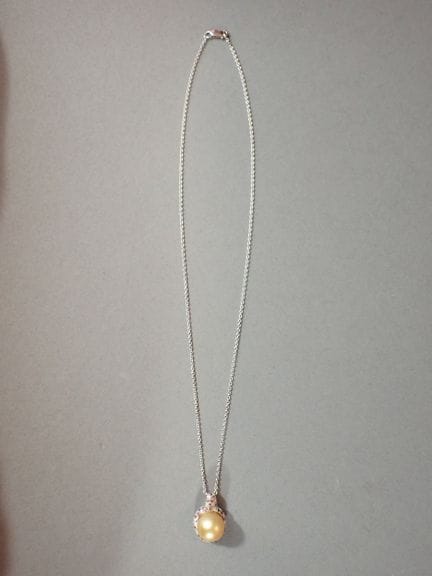 MAUBOUSSIN PARIS. Pendentif modèle « perle d’or mo