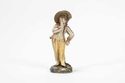 Figura masculina de porcelana policromada. Probabl