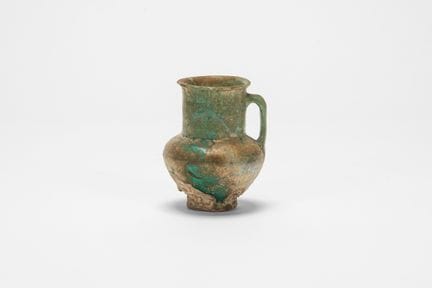 Pequeña jarra persa antigua de cerámica con esmalt
