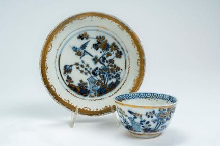 Porcelain cup and saucer with a monochrome orienta
