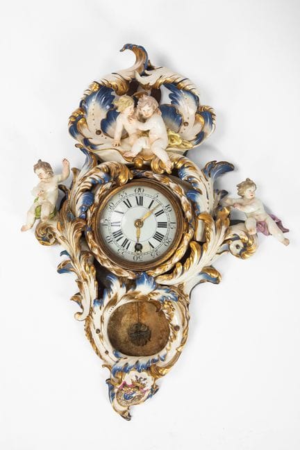 An important polychrome porcelain Cartel clock. Re