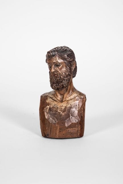 Pequeño busto masculino de un belén, tallado en ma