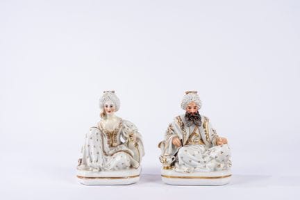 Two white, polychrome, and gilded porcelain perfum