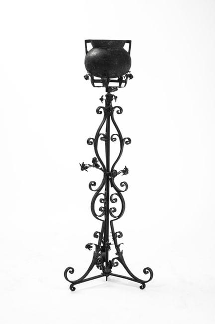 Tripod wrought iron flowerpot. With two-handled va