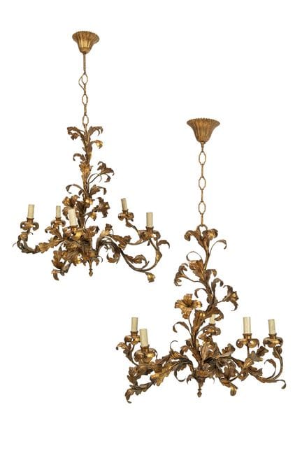 Pair of gilded metal chandeliers with leaf-shaped 