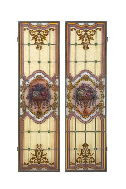 Pair of yellow-ground leaded glass windows centere