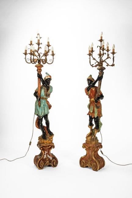 Two Moors holding torches made of lacquered wood, 