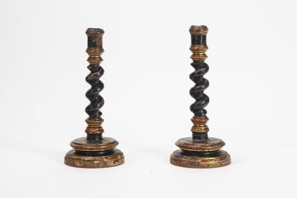 A pair of lacquered and gilded wood torchon candle
