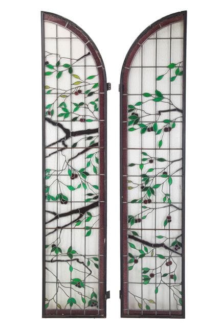Pair of shaped leaded glass windows. 20th century.