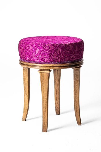Eighteenth-century-style wooden stool with a padde