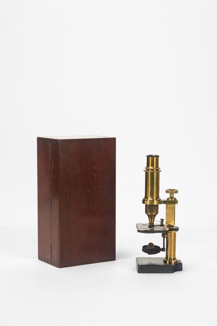Brass microscope with a Charles Marchand lens in a