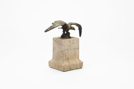 Small bronze sculpture depicting an eagle with out
