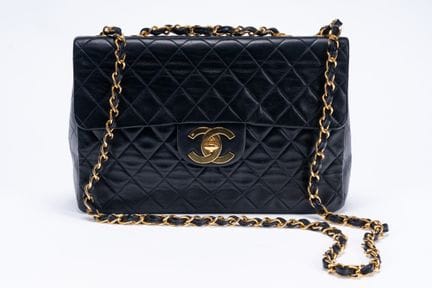 Chanel - Bag, 1994


Black matelassé leather bag, 