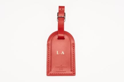 Louis Vuitton - Name Tag


Red leather name tag, "