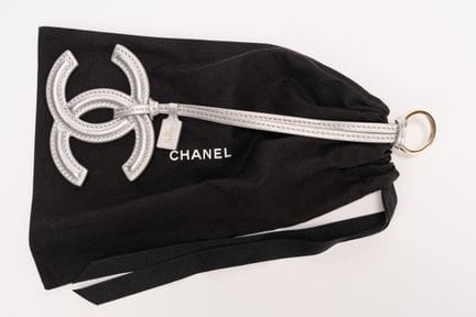Chanel - Bag Charm


Silver leather bag charm with