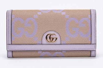 Gucci - Wallet


Beige and lilac fabric wallet wit
