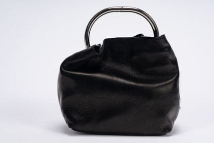 Prada - Mini Bag


Black leather mini wrist bag, 1