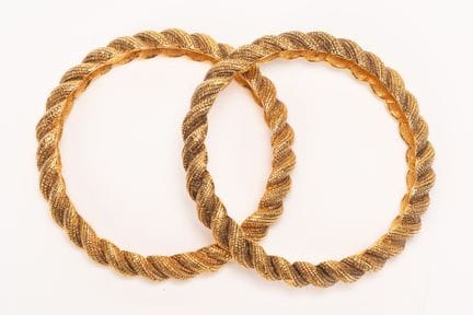 Chanel - Set of two gold-plated metal bracelets


