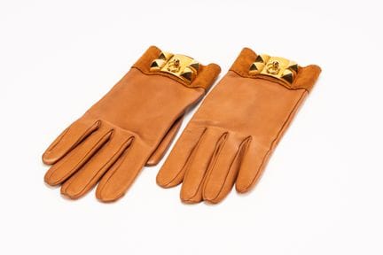 Hermès - Gloves


Gold leather and suede Collier d