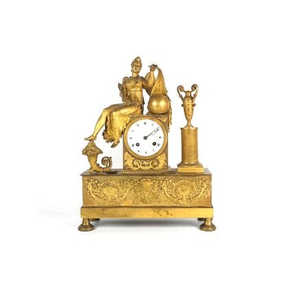 Pendule à poser en bronze doré et ciselé, mouvemen