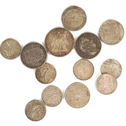 Ensemble de 13 monnaies en argent, comprenant : 
-
