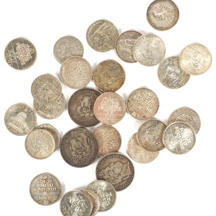Ensemble de 30 monnaies en argent, comprenant : 
-