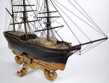 Ex-voto. 
A model of a three-masted barque fitted 