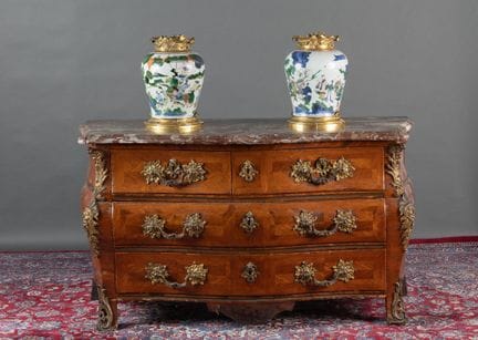 An exceptional tomb-style chest of drawers, curved