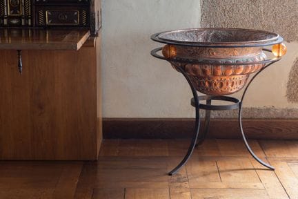Copper repoussé cooling basin with gadroons and fo