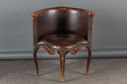 An office chair known as a “couillard,” made of wa